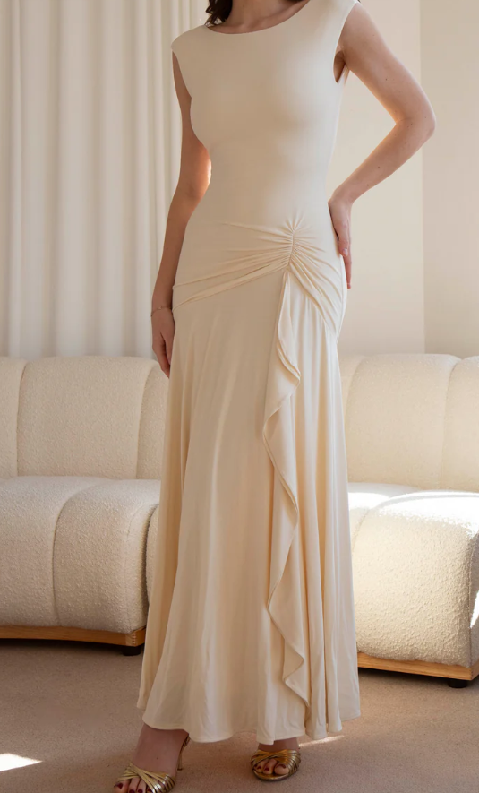 The Backless Demure Dress