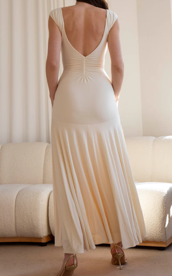 The Backless Demure Dress