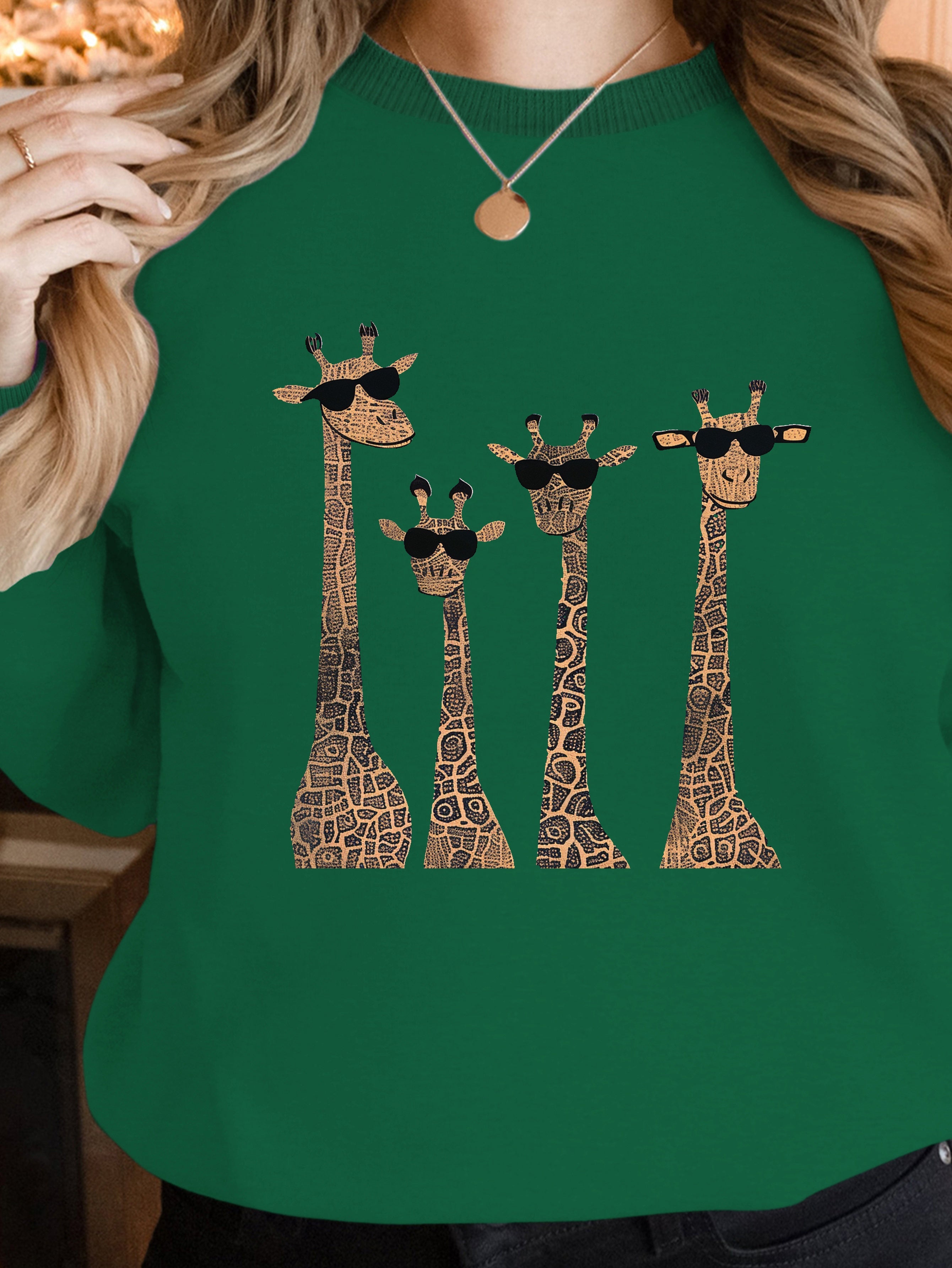 Playful giraffes wearing sunglasses women's sweatshirts