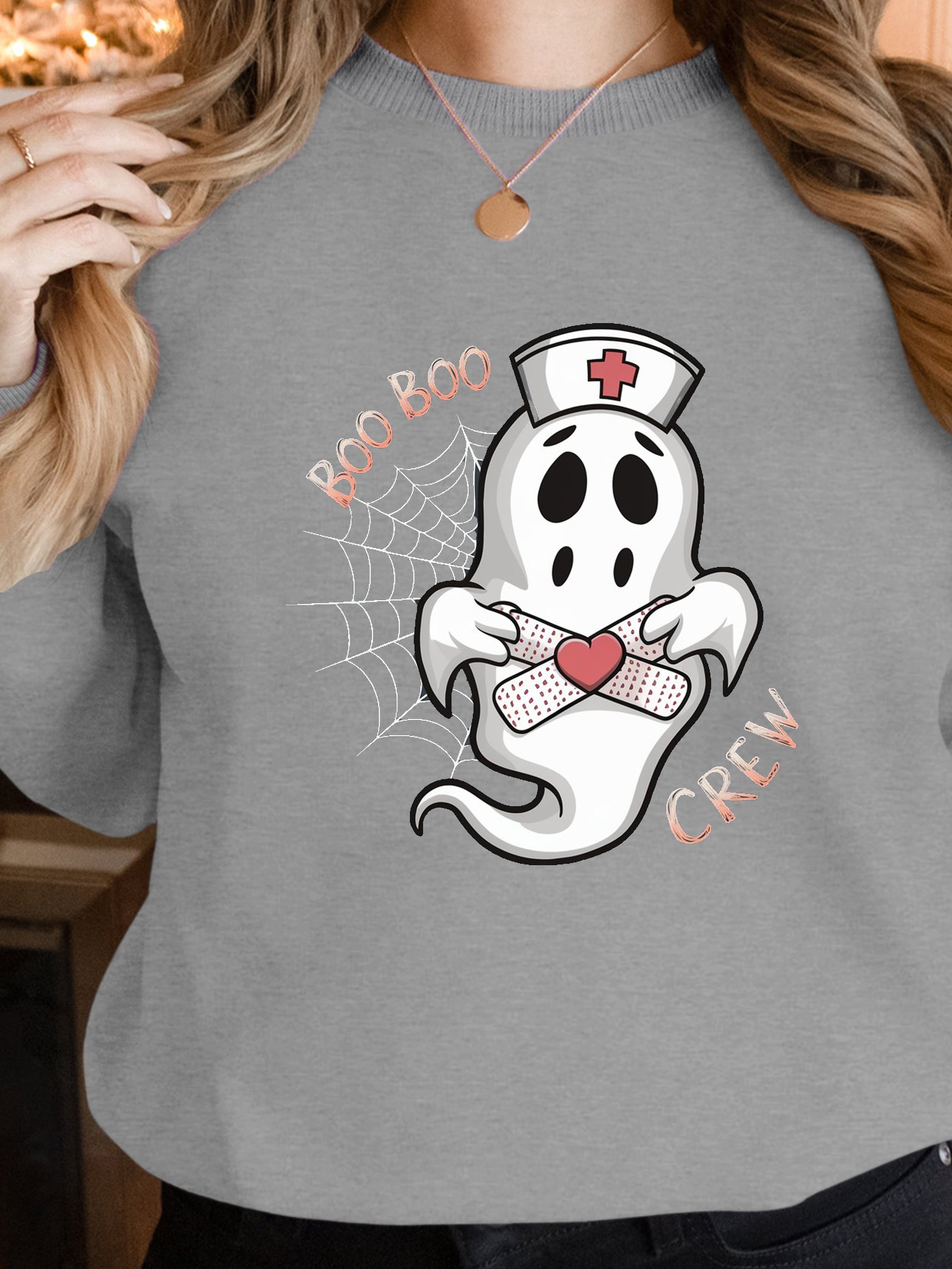 cartoon ghost nurse women's sweatshirts