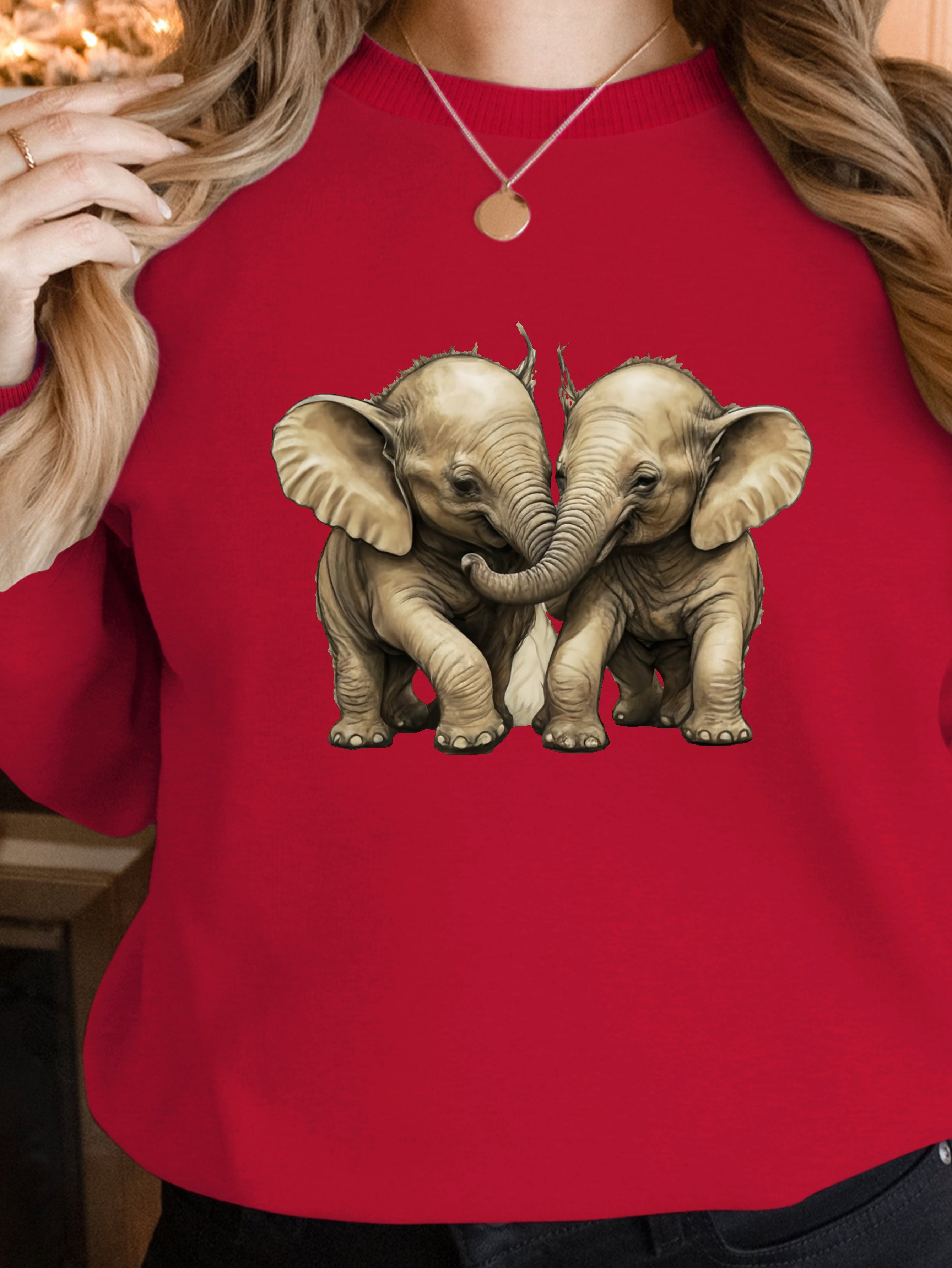 Two baby elephants playing women's sweatshirts