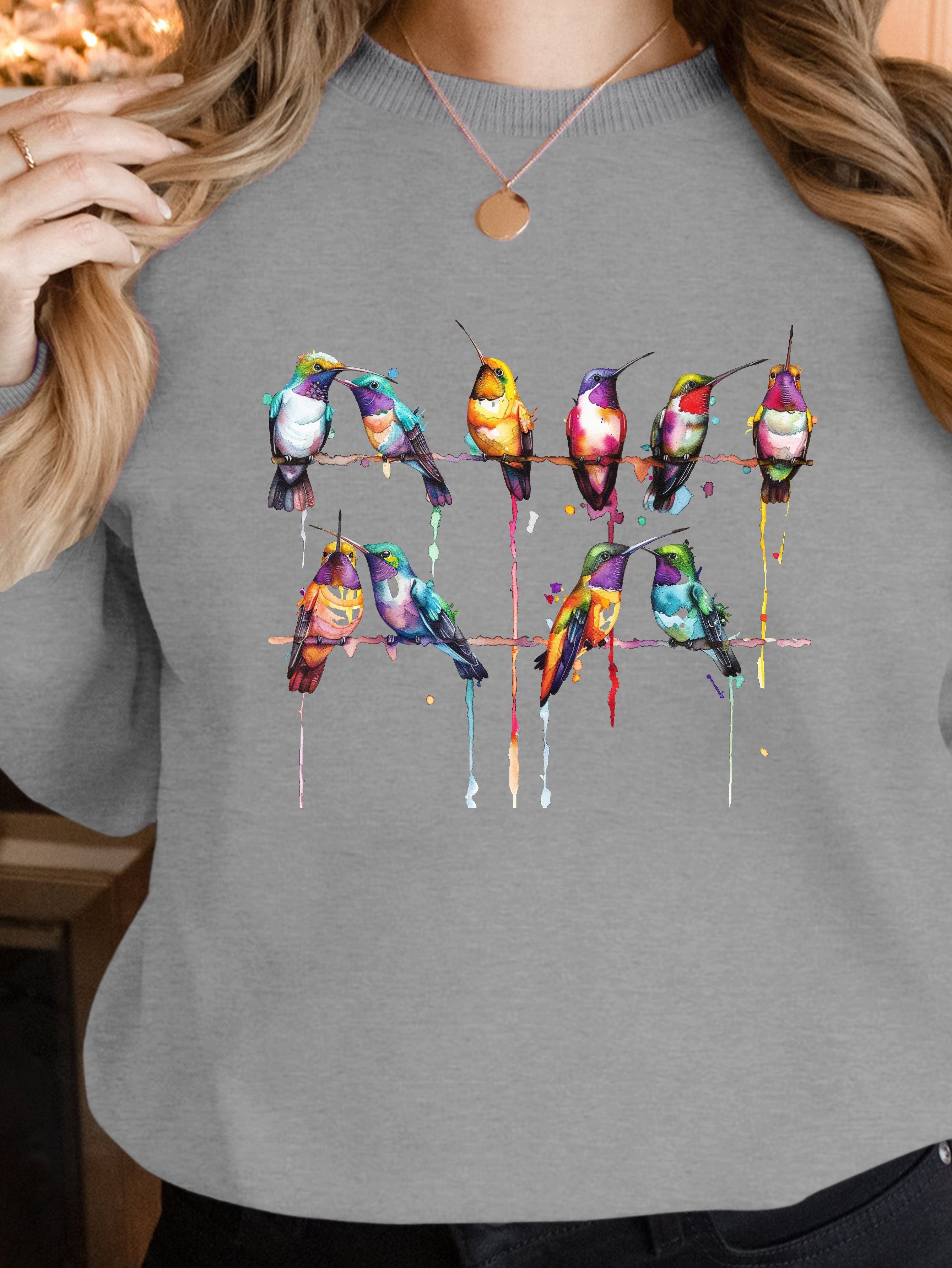 Vibrant watercolor style hummingbirds women's sweatshirts