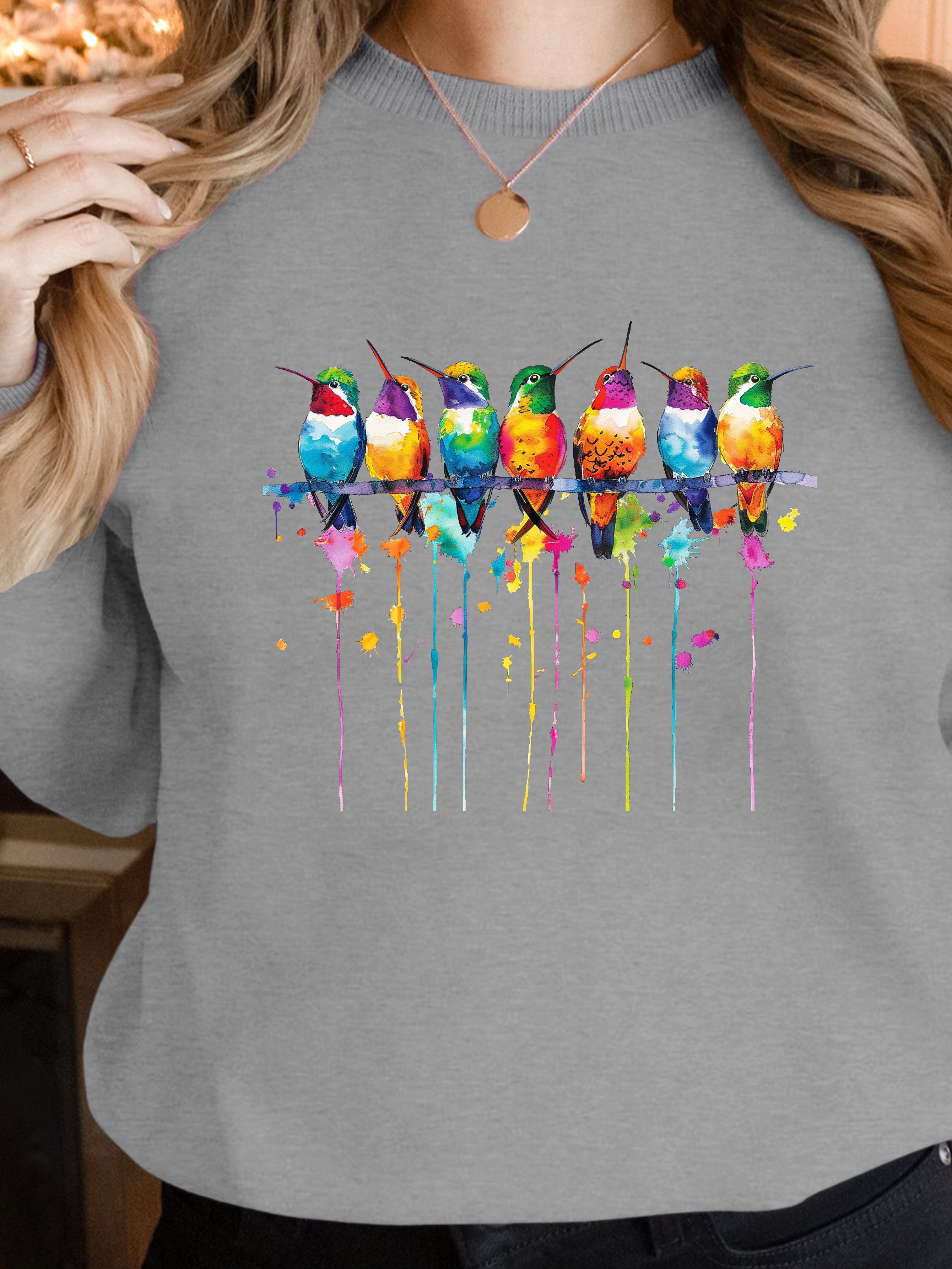 Vibrant watercolor style hummingbirds women's sweatshirts