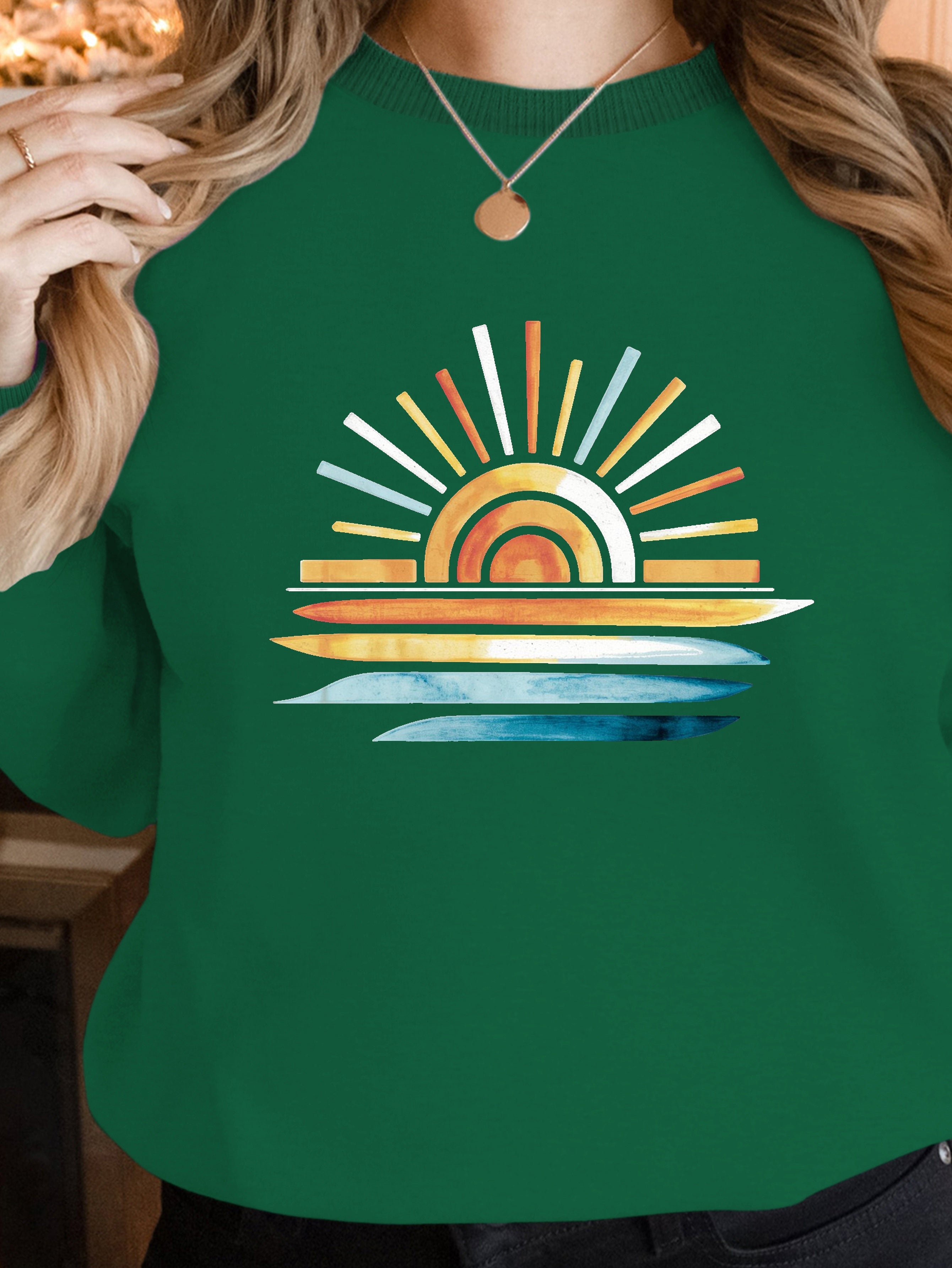 sunset on water women's sweatshirts