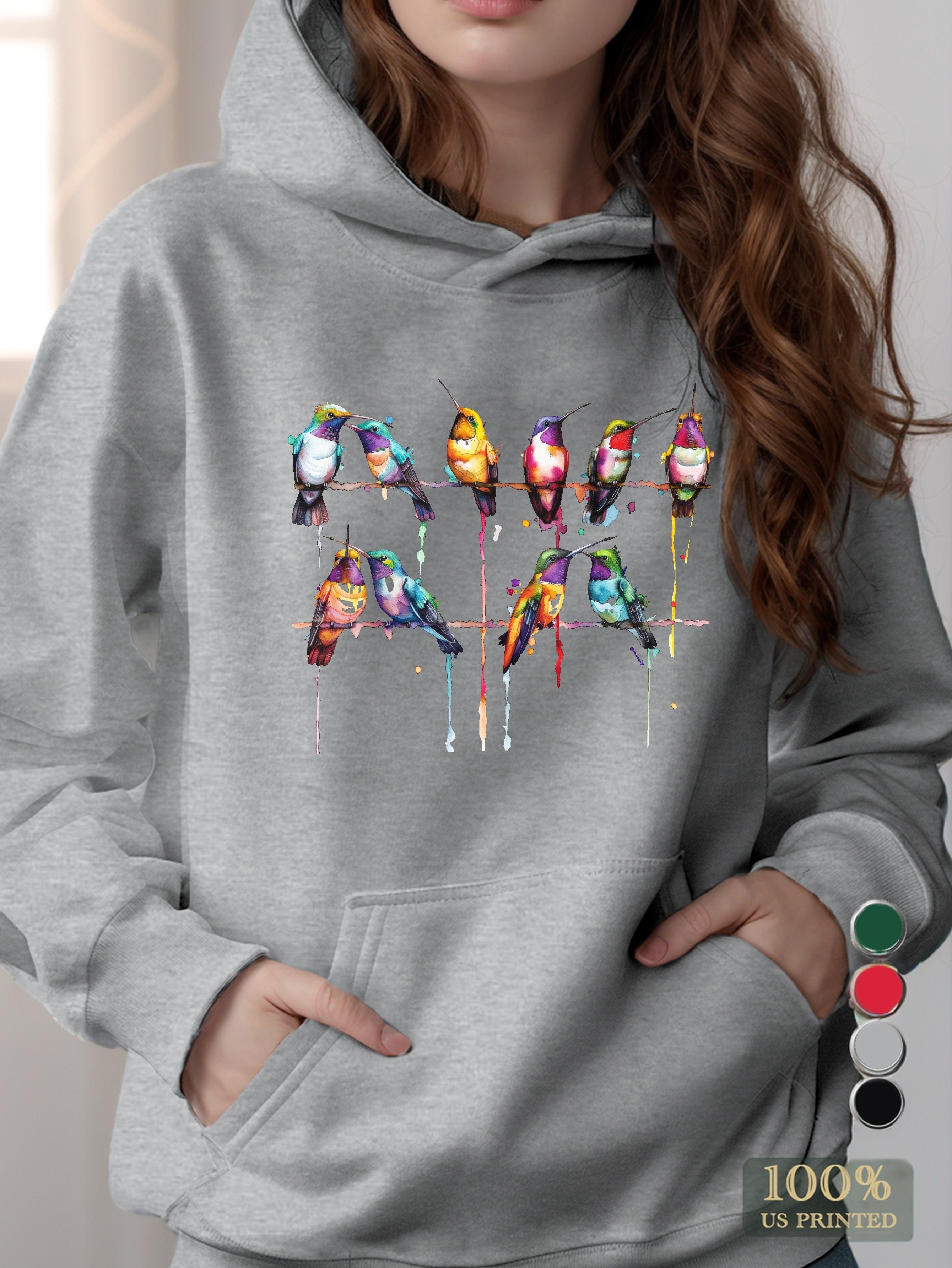 Vibrant watercolor style hummingbirds women's hooded sweatshirt