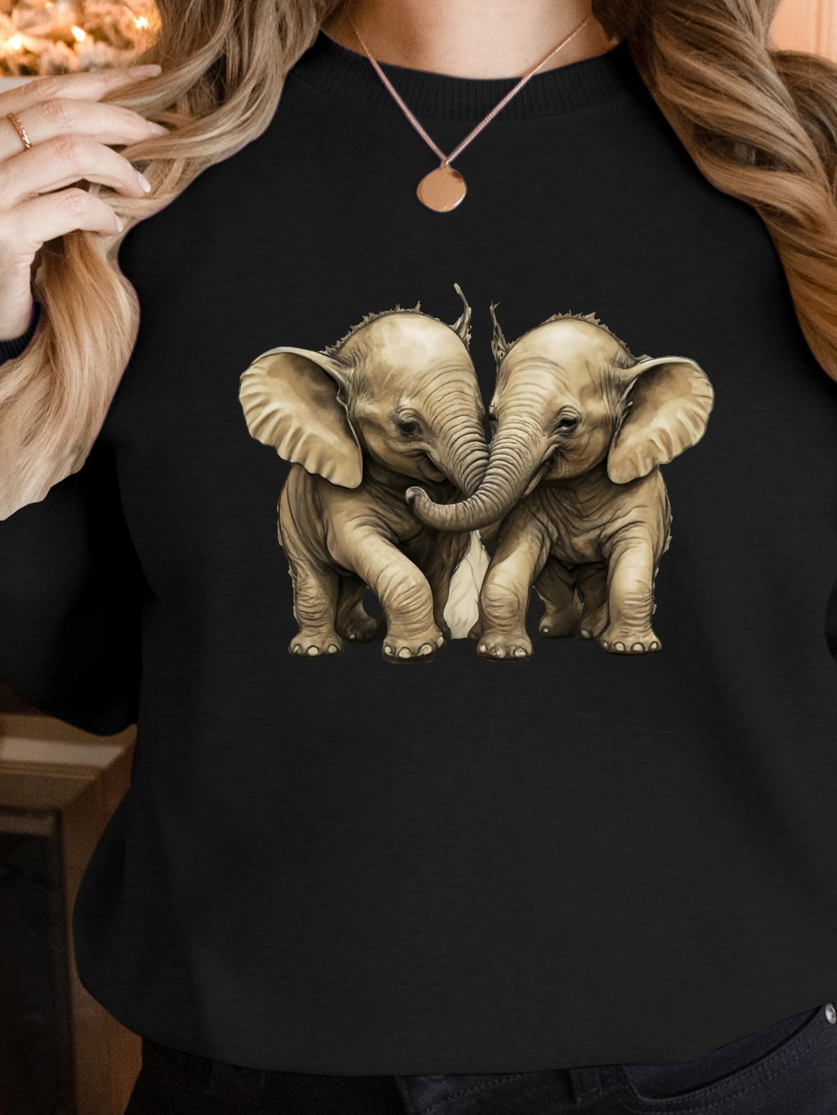 Two baby elephants playing women's sweatshirts