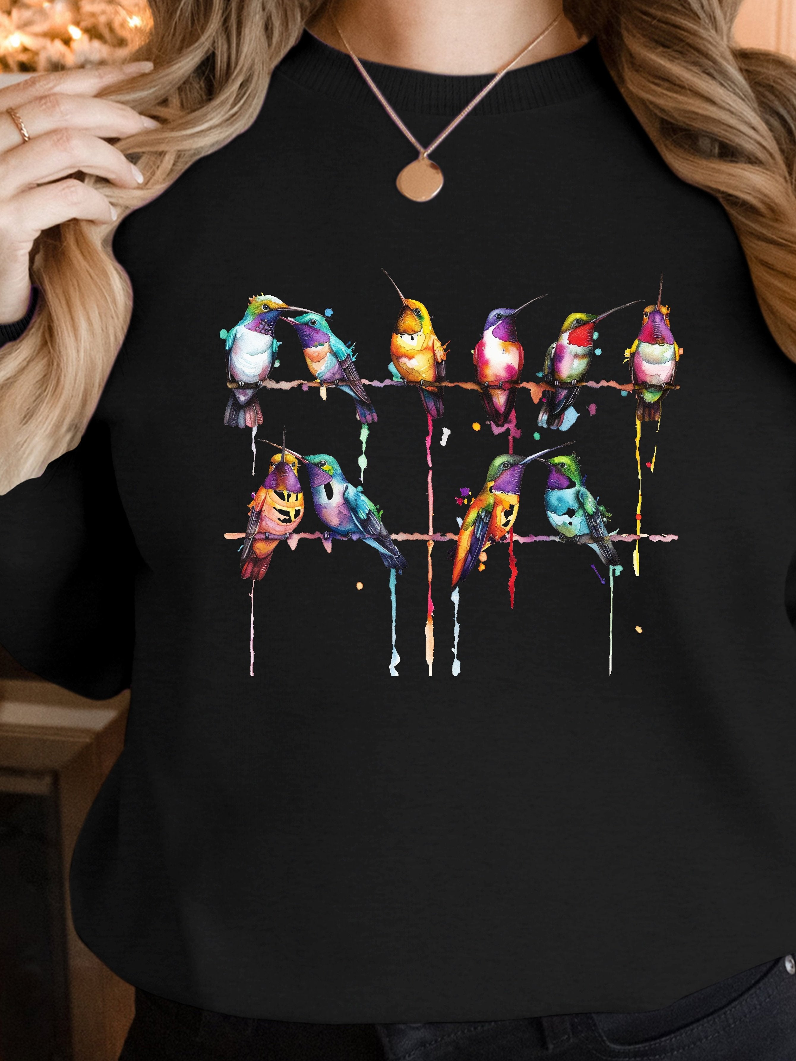 Vibrant watercolor style hummingbirds women's sweatshirts