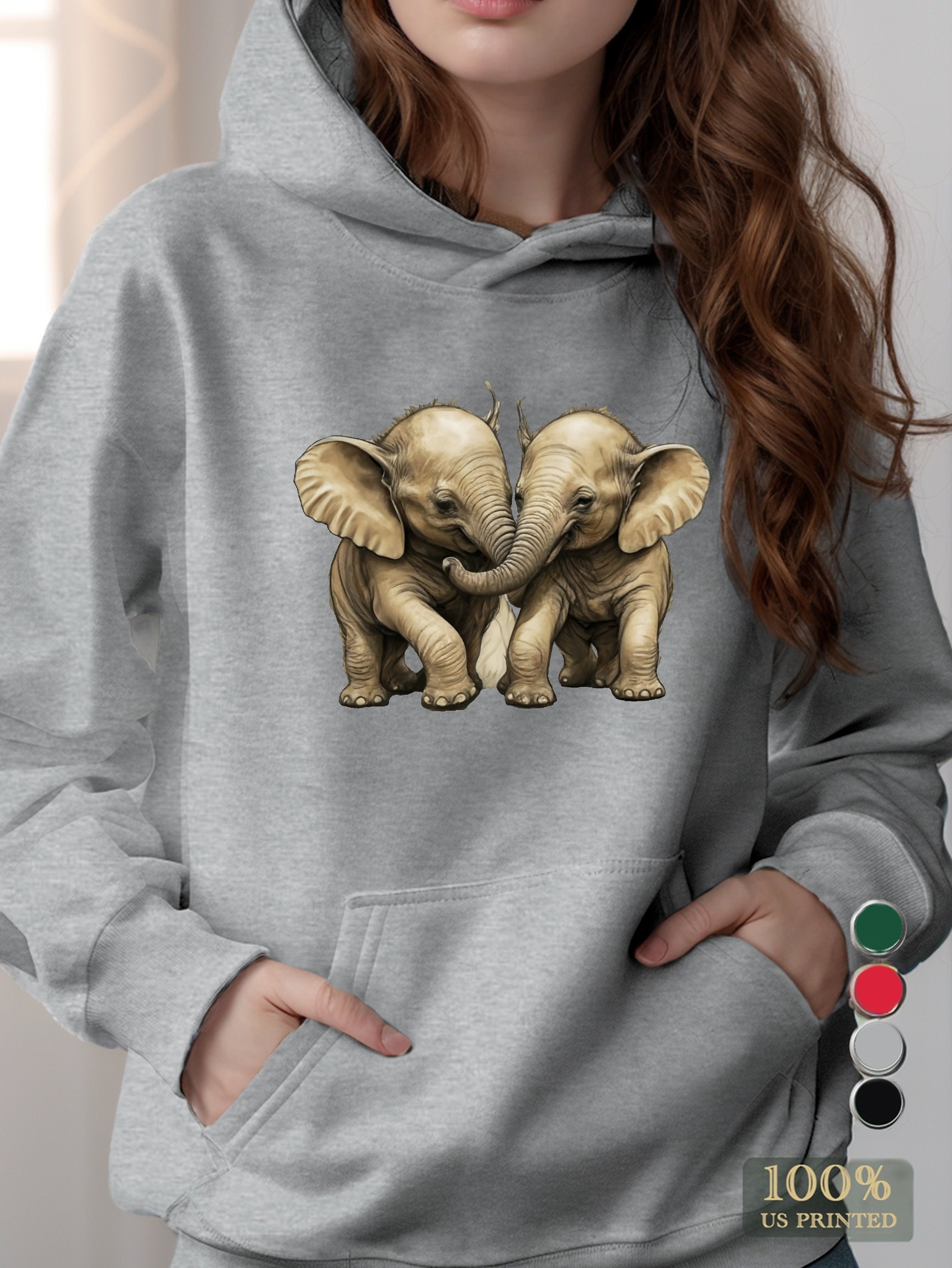 Two baby elephants playing women's hooded sweatshirt