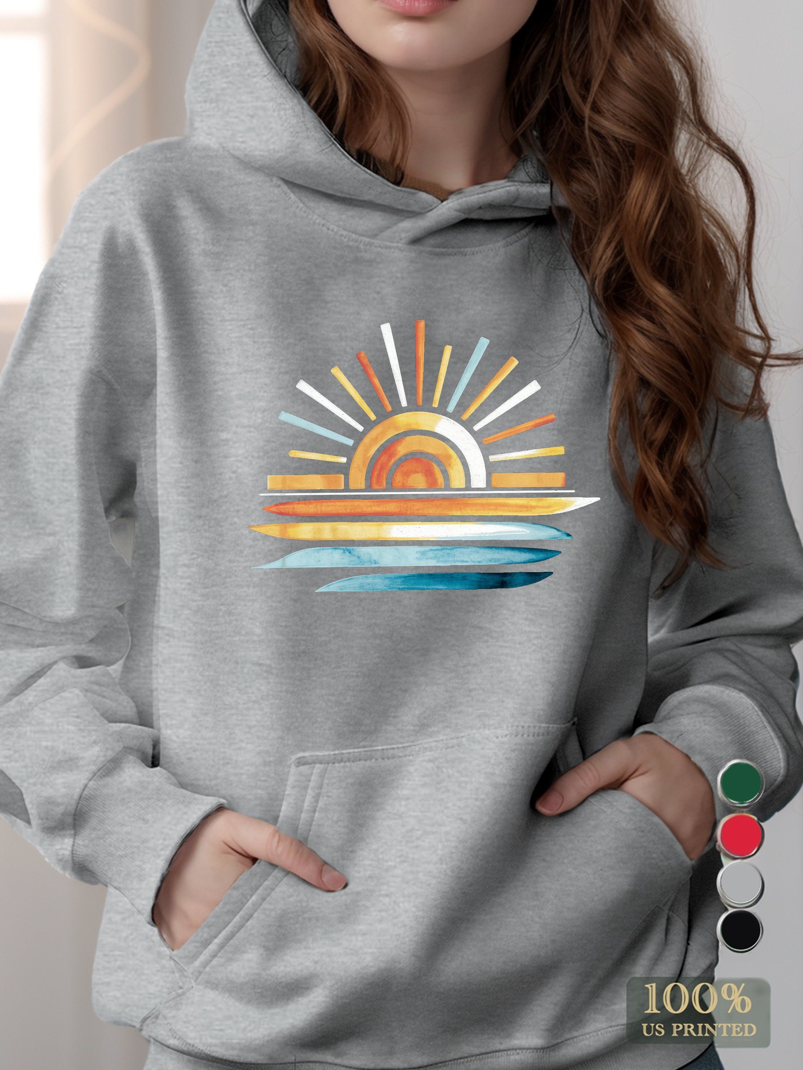 sunset on water women's hooded sweatshirt